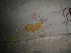 In the tunnels of Fort Point is a collection of paintings that bring the feeling of ancient cave paintings. 